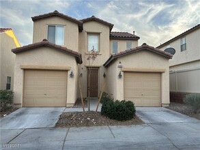 5869 Secret Island Dr in Las Vegas, NV - Building Photo - Building Photo