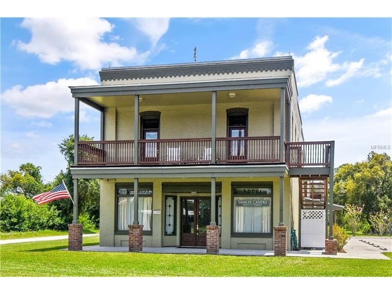 1350 S Canoe Creek Rd in Kenansville, FL - Building Photo