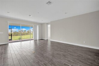 12329 Isabella Dr in Bonita Springs, FL - Building Photo - Building Photo