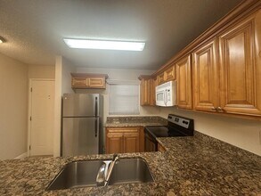 1561 Windorah Way, Unit H in West Palm Beach, FL - Building Photo - Building Photo