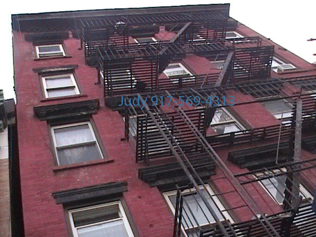 217 E Houston St in New York, NY - Building Photo - Building Photo