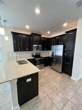 8545 Zoeller Hills Dr in Four Corners, FL - Building Photo - Building Photo