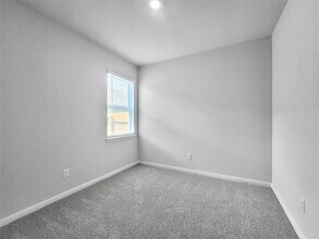 7603 Thrips Ln in Richmond, TX - Foto de edificio - Building Photo