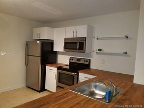 10161 W Sunrise Blvd-Unit -104 in Plantation, FL - Building Photo - Building Photo