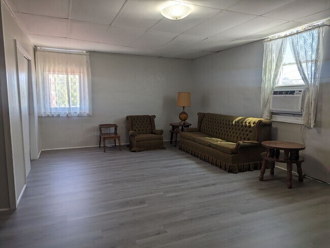 property at 106 E 3rd St