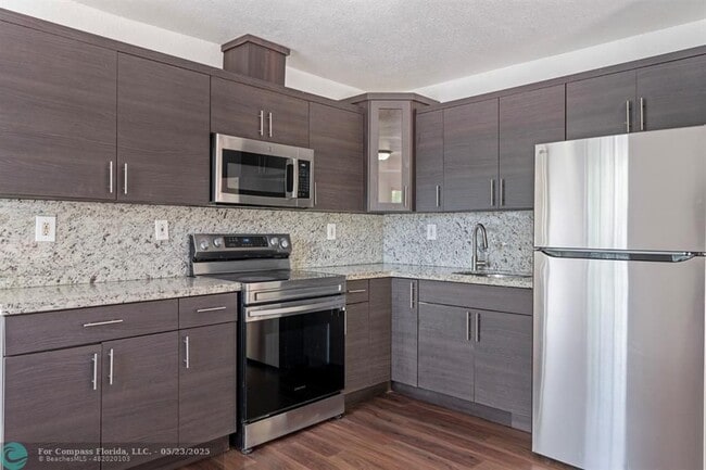 property at 323 NW 97th St