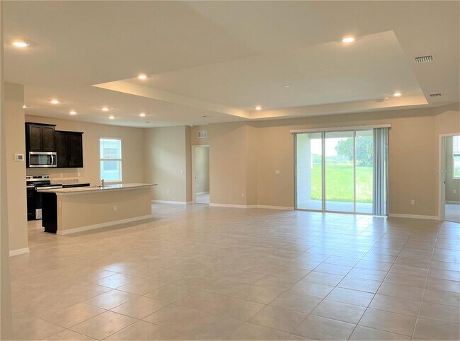 13811 Whiskey Daisy Dr in Dade City, FL - Building Photo - Building Photo