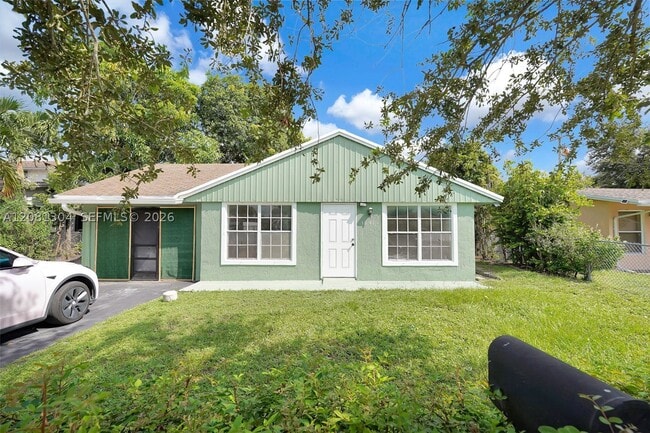 property at 3541 NW 7th St