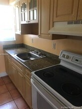 9260 Bay Harbor Terrace-Unit -24 in Bay Harbor Islands, FL - Building Photo - Building Photo