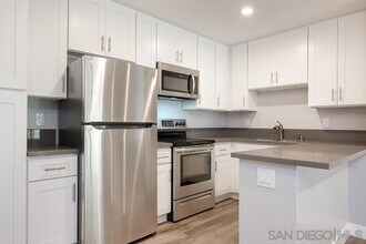 6394 Rancho Mission Rd in San Diego, CA - Building Photo - Building Photo