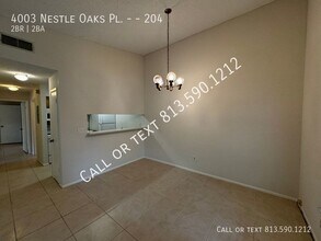 4003 Nestle Oaks Pl-Unit -204 in Tampa, FL - Building Photo - Building Photo
