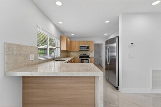 8695 SW 51st Pl in Cooper City, FL - Building Photo - Building Photo