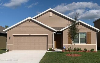 3400 Burrowing Owl Dr in Mims, FL - Building Photo