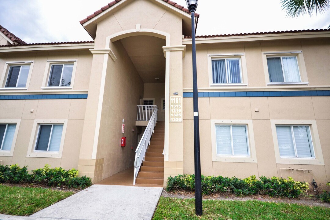 1161 Golden Lakes Blvd-Unit -1325 in West Palm Beach, FL - Building Photo