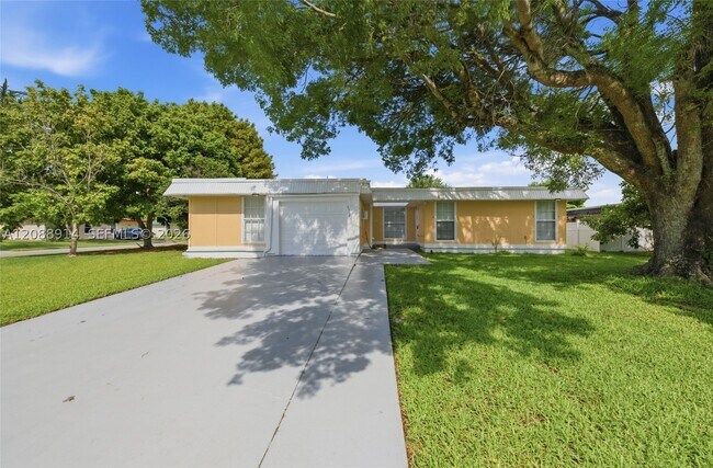 property at 6316 NW 74th Ave