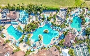 8051 Players Cove Dr, Unit 202 in Naples, FL - Foto de edificio - Building Photo