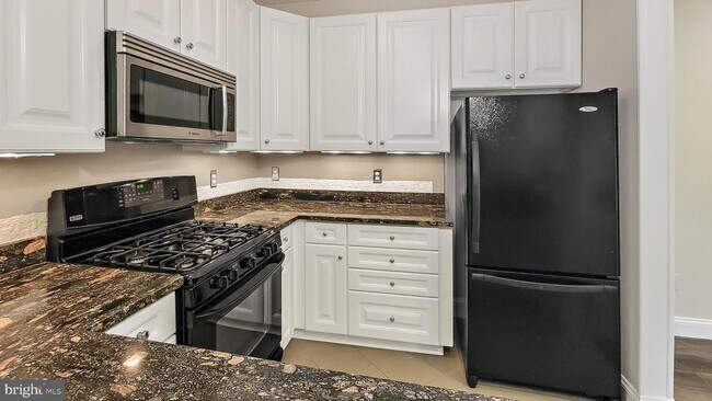 12012 Taliesin Pl-Unit -26 in Reston, VA - Building Photo - Building Photo