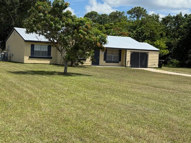 property at 3331 SW Ensley Ct
