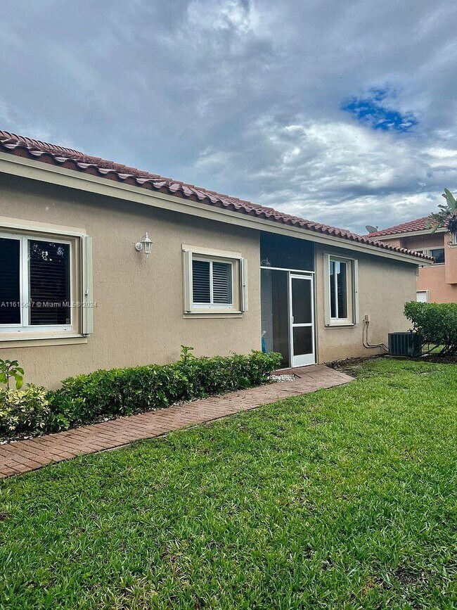 12584 NW 57th Pl in Coral Springs, FL - Building Photo - Building Photo