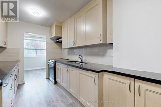 207 MAIN LEVEL - 4064 LAWRENCE Ave in Toronto, ON - Building Photo - Building Photo