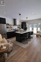 10 Sweet Cicely St in Springwater, ON - Building Photo