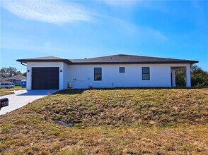 1100 Homer Ave S in Lehigh Acres, FL - Building Photo - Building Photo