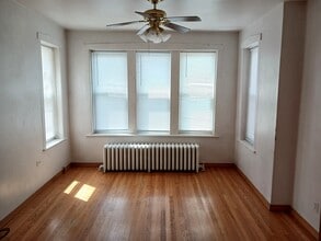 5902 W Wilson Ave, Unit 1st floor in Chicago, IL - Building Photo - Building Photo