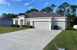 6157 NW Gatun Dr in Port St. Lucie, FL - Building Photo