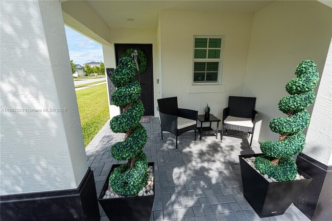 6172 NW Sweetwood Dr in Port St. Lucie, FL - Building Photo - Building Photo