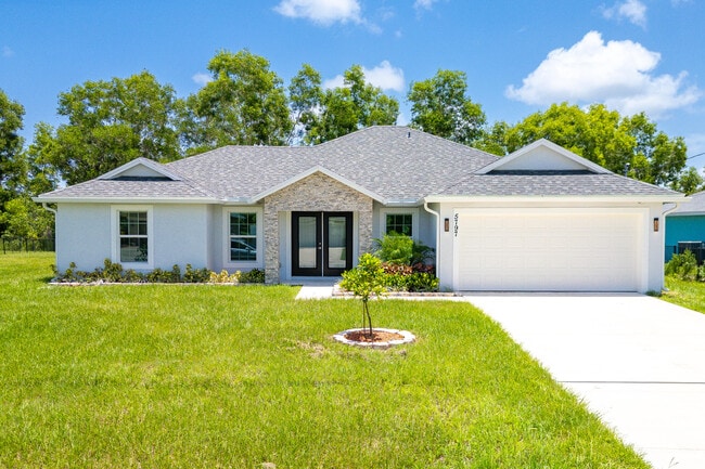 property at 5797 NW Coosa Dr