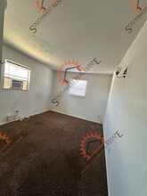 1404 S Avenue J in Portales, NM - Foto de edificio - Building Photo