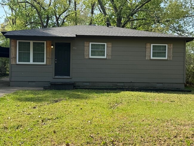 property at 7711 Woodhaven Dr