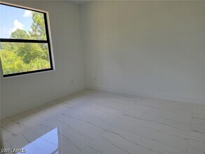 886 Milwaukee Blvd in Lehigh Acres, FL - Building Photo - Building Photo