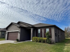 8762 Micmac Ct in Polk City, FL - Foto de edificio - Building Photo