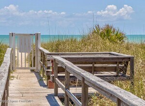 4800 Ocean Beach Blvd in Cocoa Beach, FL - Building Photo - Building Photo
