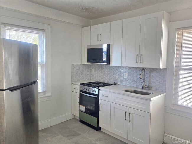 property at 118-38 219th St