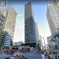 8 Eglinton Ave E in Toronto, ON - Building Photo