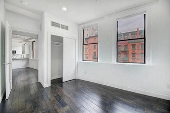 63 Spring St in New York, NY - Building Photo - Building Photo