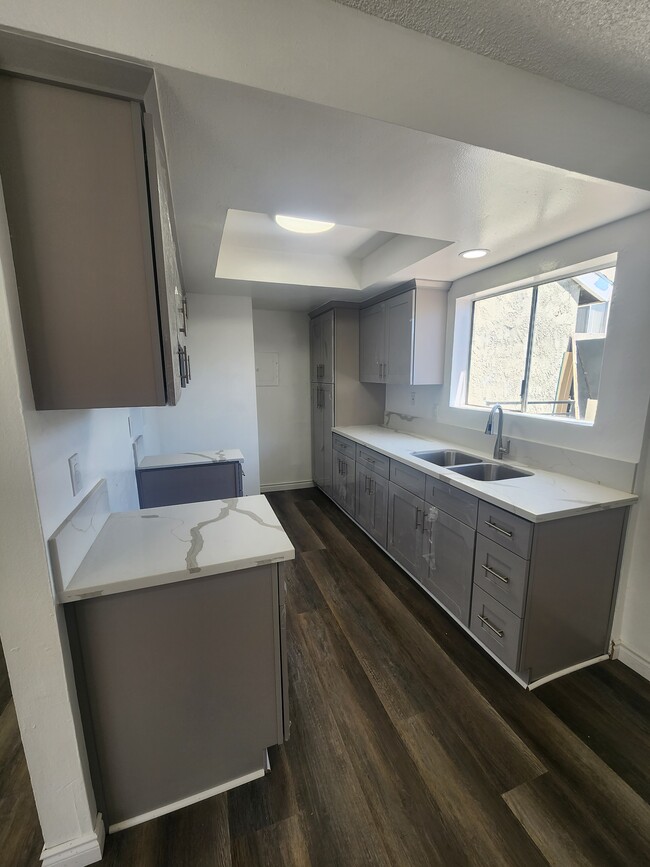 property at 1451 W 146th St
