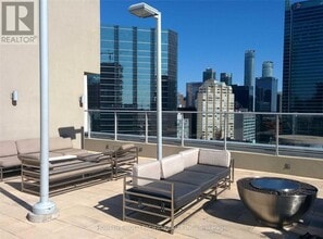 126-126 Simcoe St in Toronto, ON - Building Photo - Building Photo