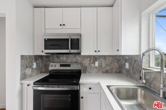 15840 Chatsworth St in Los Angeles, CA - Building Photo - Building Photo