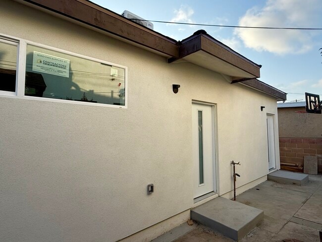 property at 3877 S Van Ness Ave