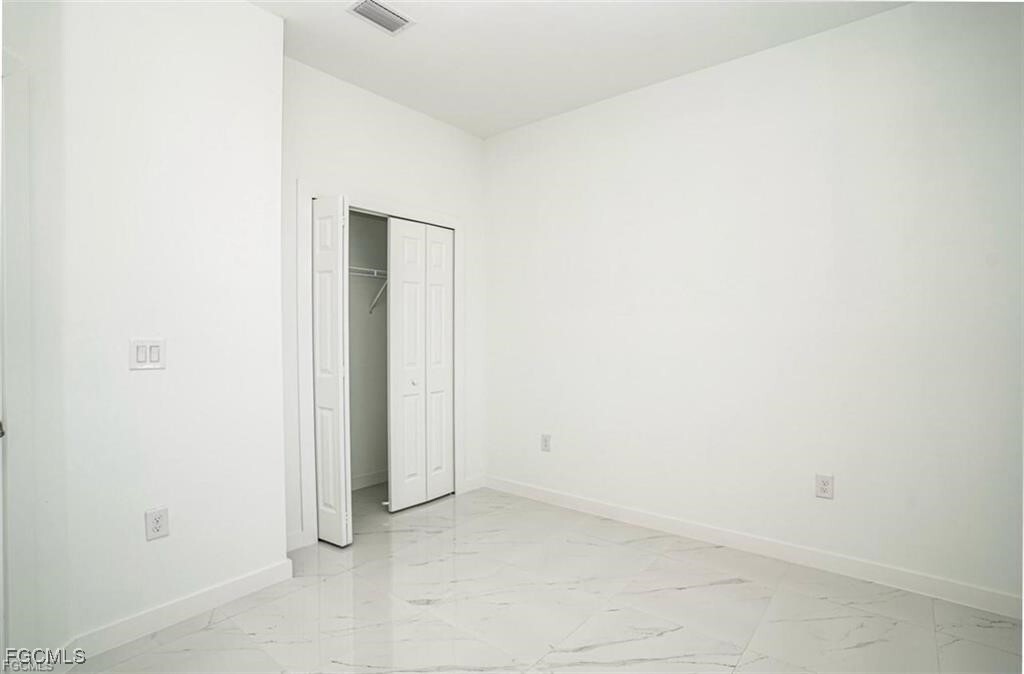 2427 Mansfield Ave S in Lehigh Acres, FL - Building Photo