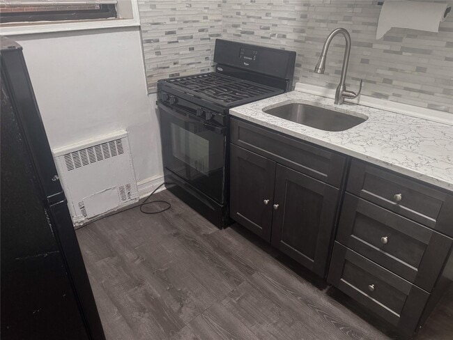 property at 83-40 Austin St