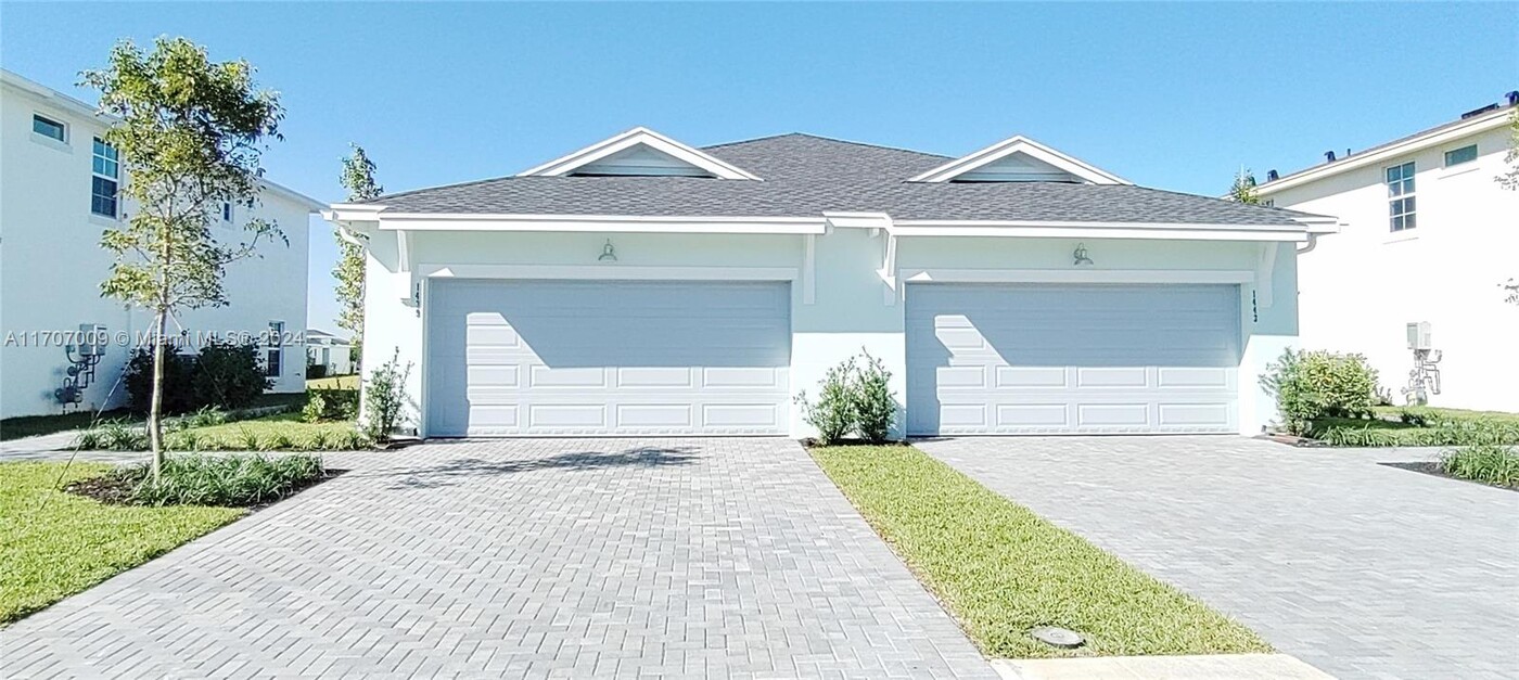 1439 Tangled Orchard Tr in Loxahatchee, FL - Building Photo