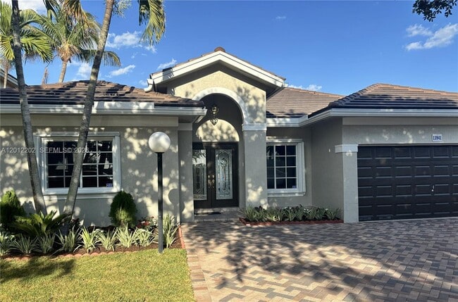 property at 13941 SW 136th Pl