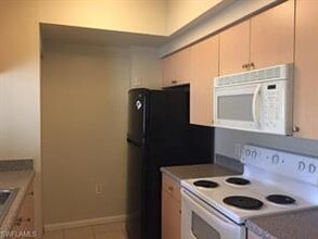 1170 Reserve Way-Unit -104 in Naples, FL - Building Photo - Building Photo