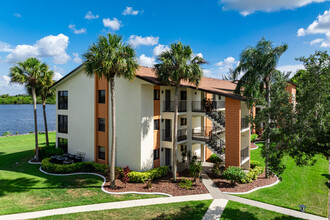 Bay Pointe Yacht & Racquet Club Condos in North Fort Myers, FL - Building Photo - Building Photo