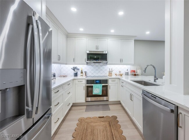 property at 6371 Pelican Bay Blvd