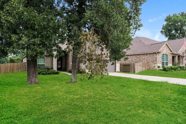7565 Tyler Run in Conroe, TX - Foto de edificio - Building Photo